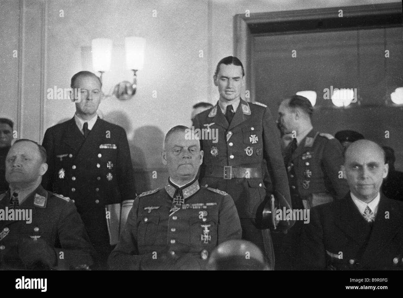 Nazi commanders headed by General Field Marshal Keitel signing the act ...