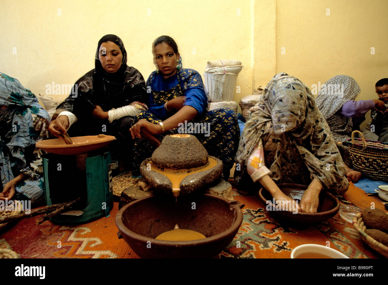 Morocco, High Atlas, fabrication of the argan oil by the Berber women Stock Photo