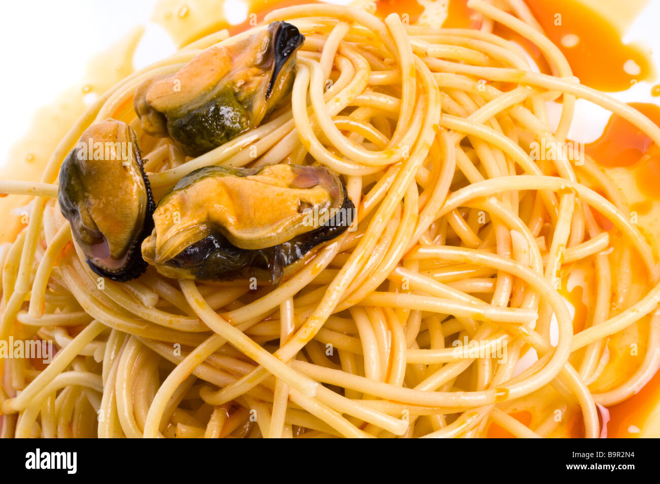 Mussels in red sauce Stock Photo Alamy