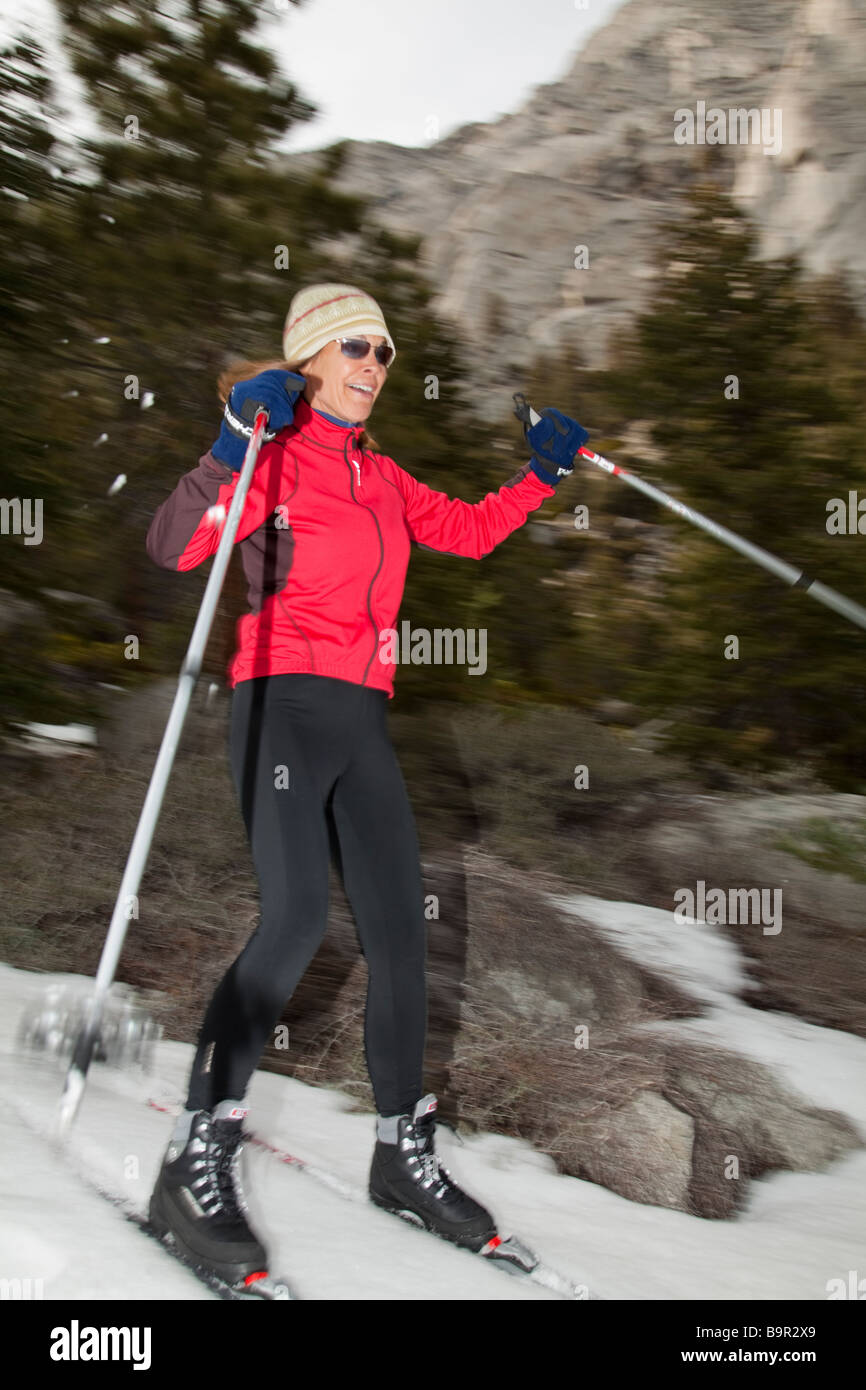 Woman cross country skiing. Stock Photo