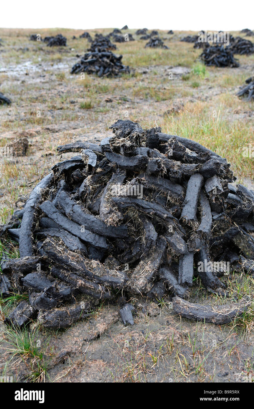 Drying peat, West coast of Donegal, Republic of Ireland Stock Photo Alamy