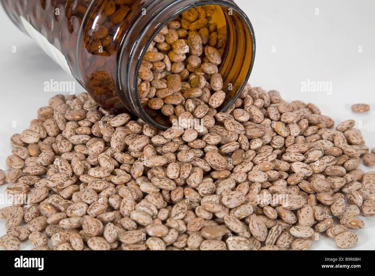 Beans pinto beans lentils legume being stored in a jar Stock Photo Alamy