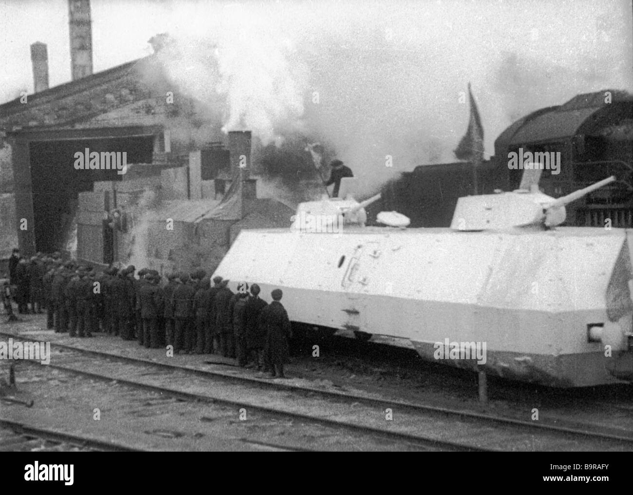 An armored train which was assembled at a Moscow factory rolls off to ...