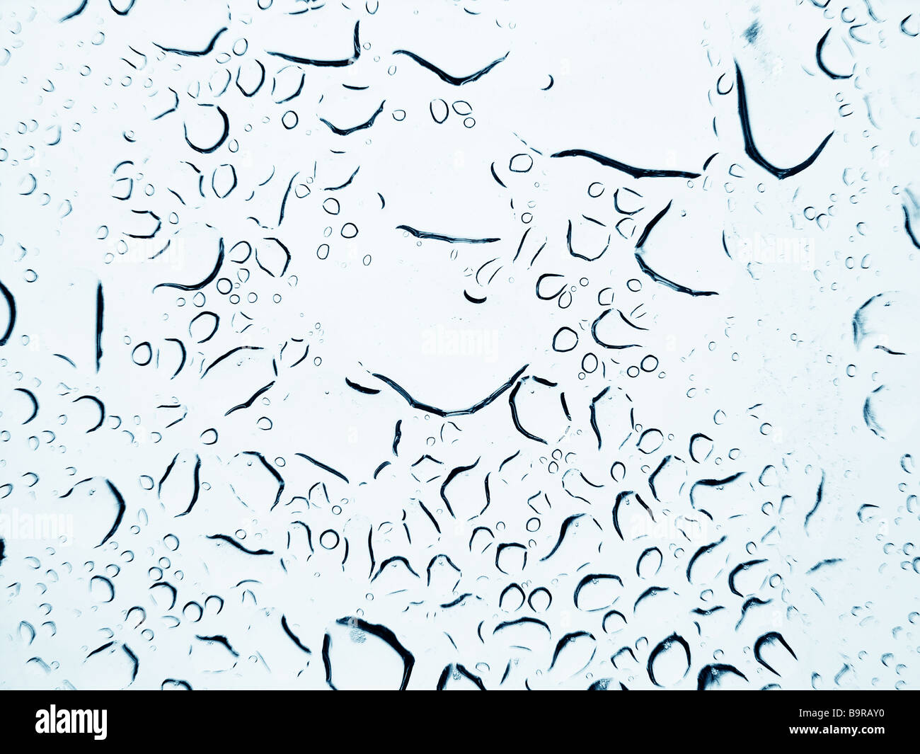 Rain drops on glass Background Stock Photo - Alamy