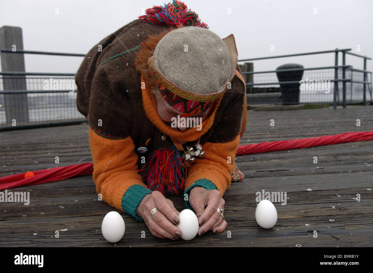 People the spring equinox by standing eggs on end Stock Photo