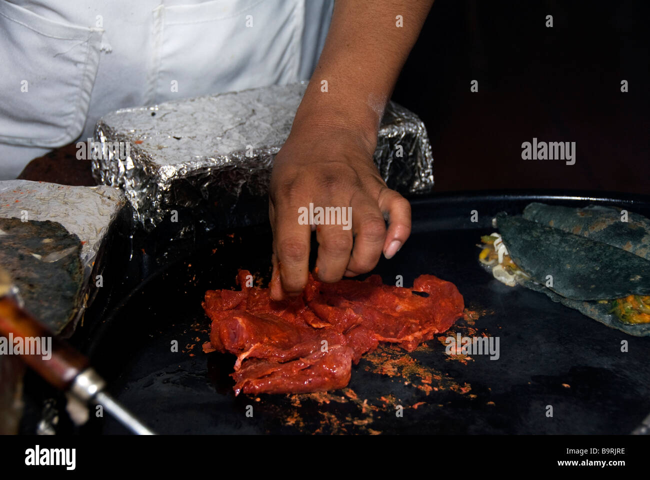 Mexican cuisine, preparing tacos Stock Photo