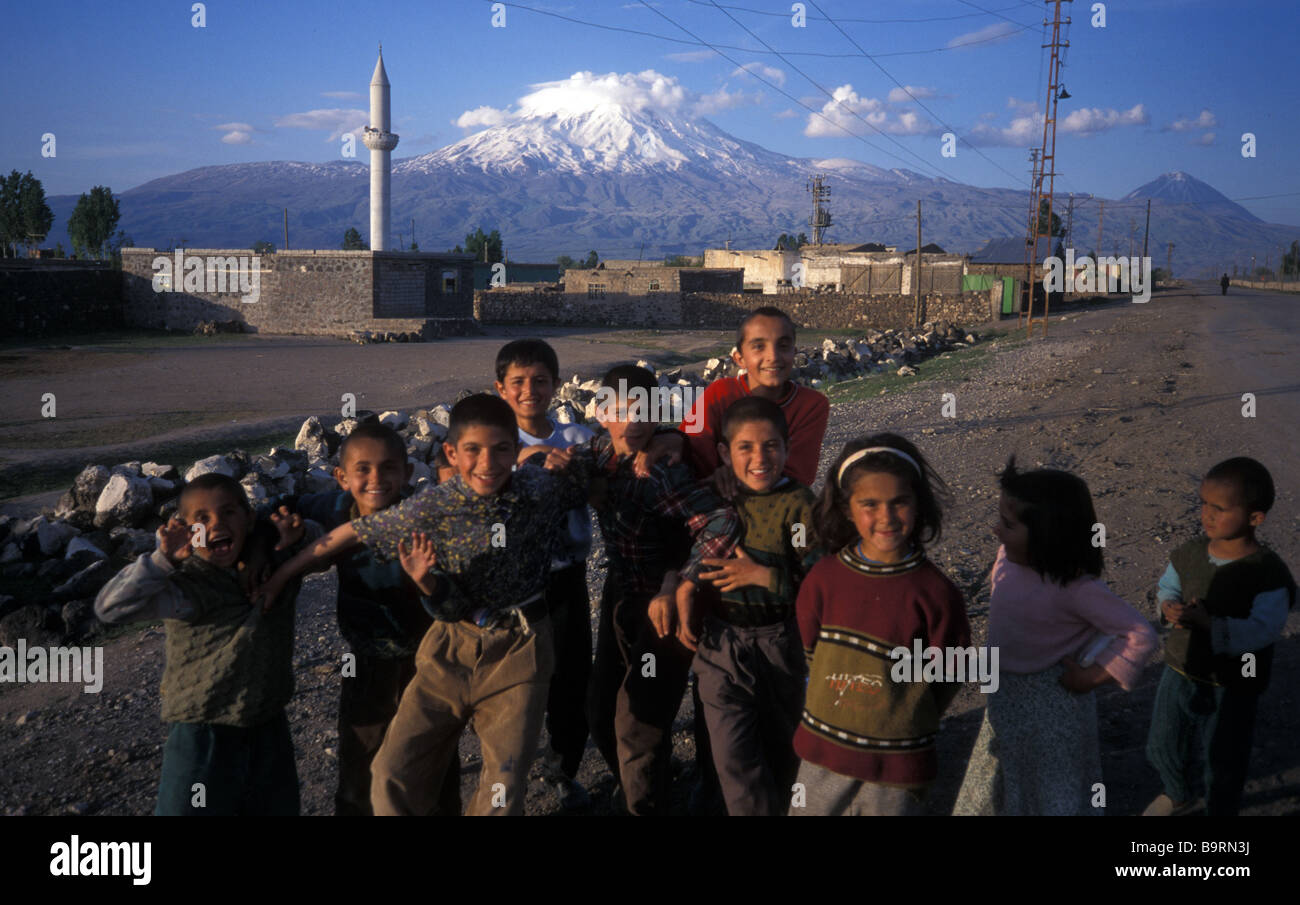 kurdish village children in Doubayazit Mount Ararat behind Turkey Stock Photo