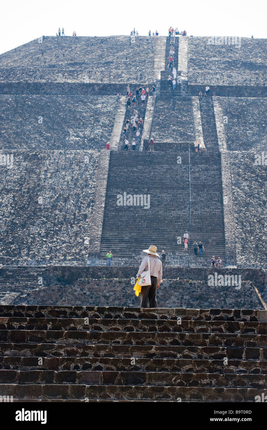 Tourists climbing the steps of the Pyramid of the Sun, at Teotihuacan