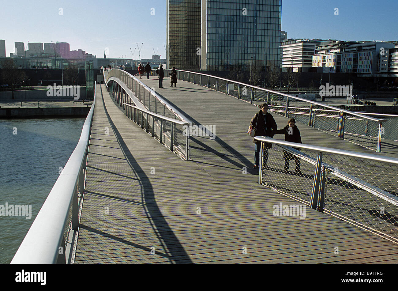 Paris, Pont Simone de Beauvoir, view towards the Left Bank and Bibliothèque Nationale, early morning. Stock Photo
