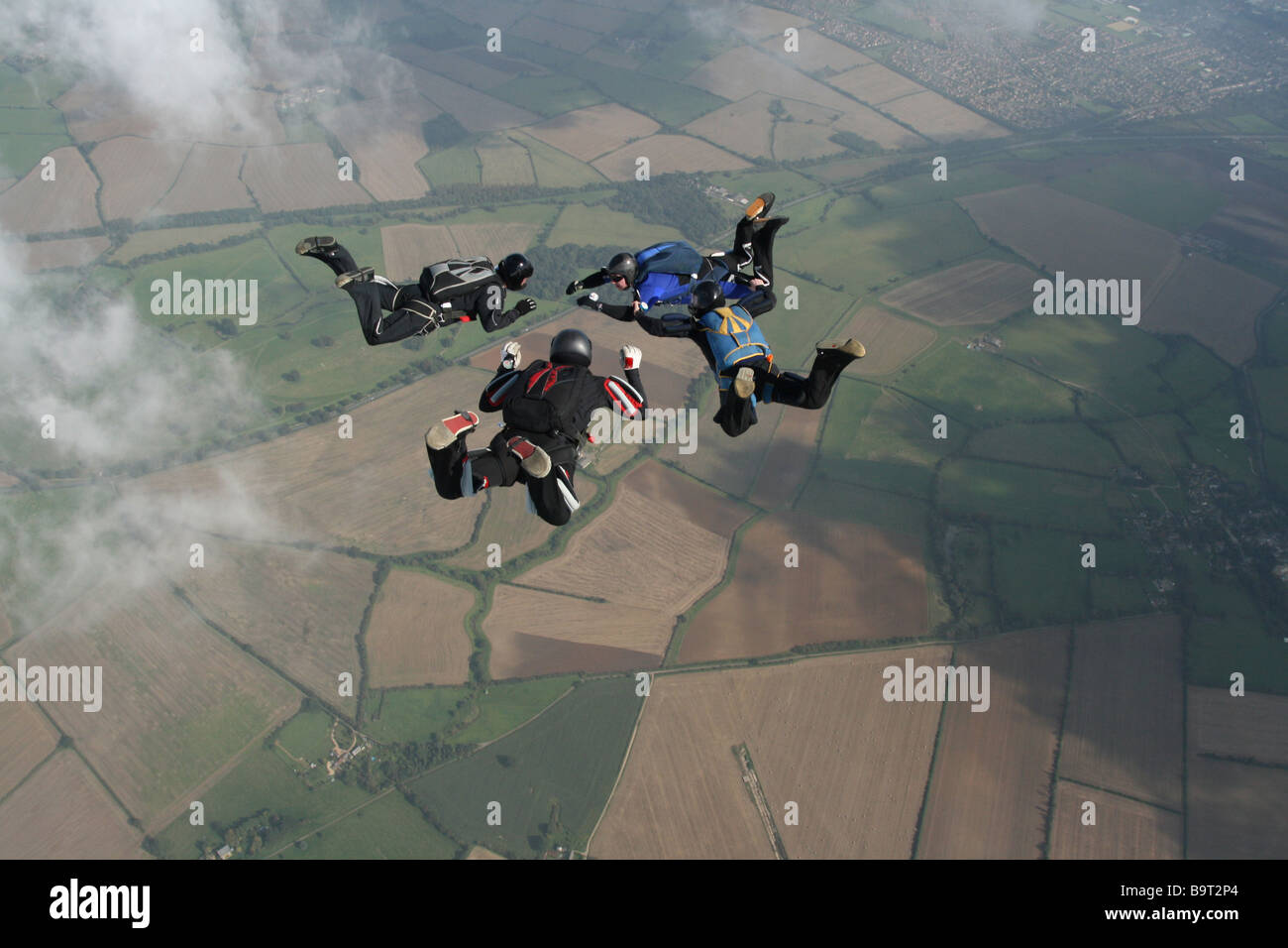 four-skydivers-doing-formations-stock-photo-alamy
