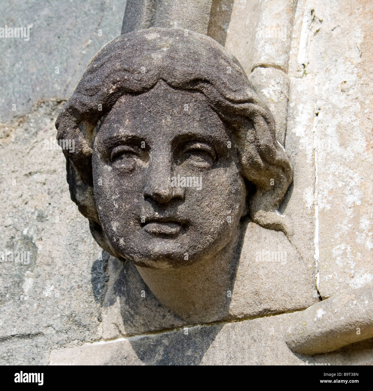 Stone face, carved stone Stock Photo Alamy