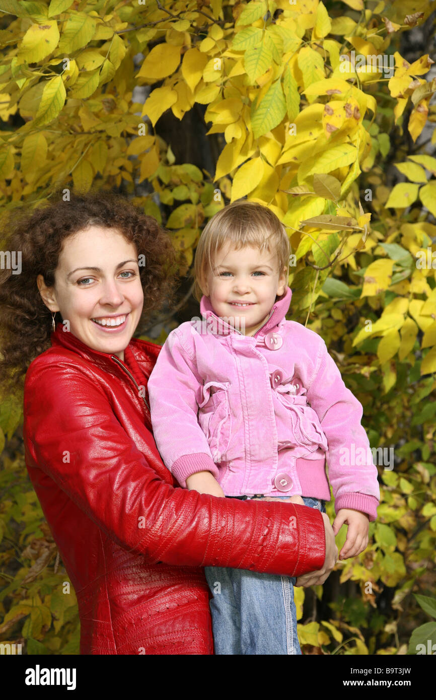 mother and daughter in the park in autumn Stock Photo - Alamy