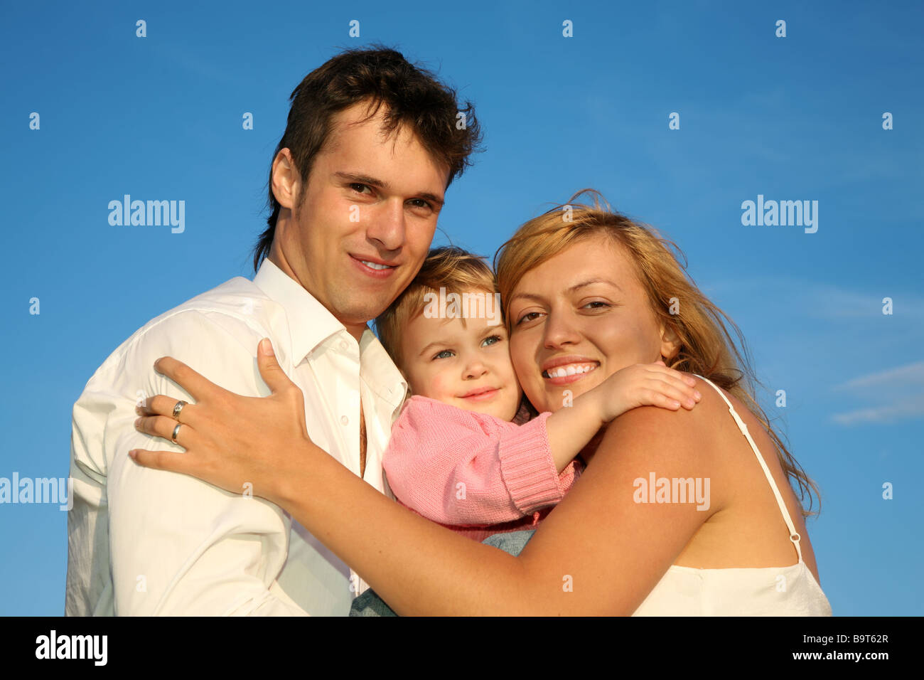 young happy family Stock Photo - Alamy