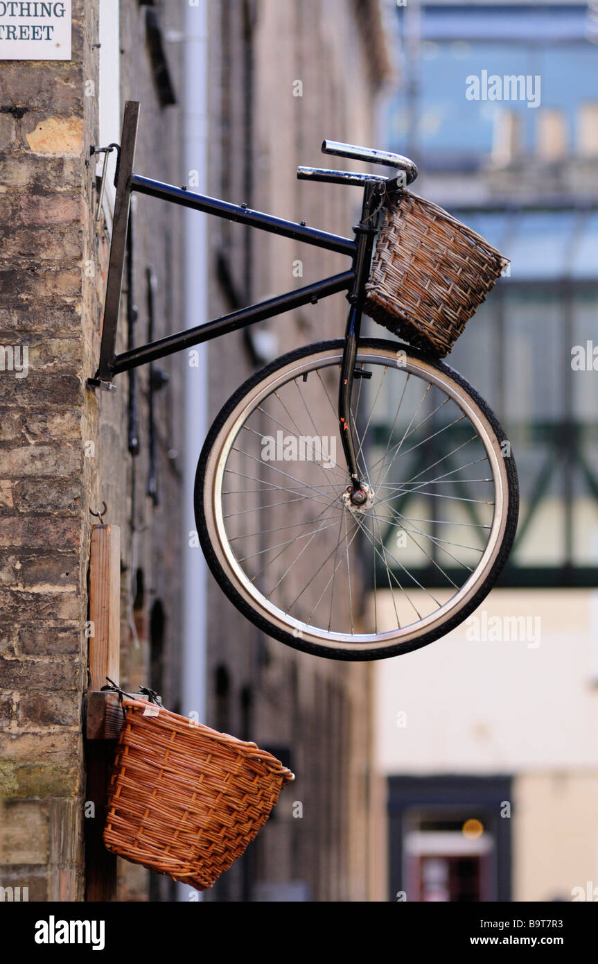 Bicycle mounted on the wall of a Cycle shop, Laundress Lane, Cambridge