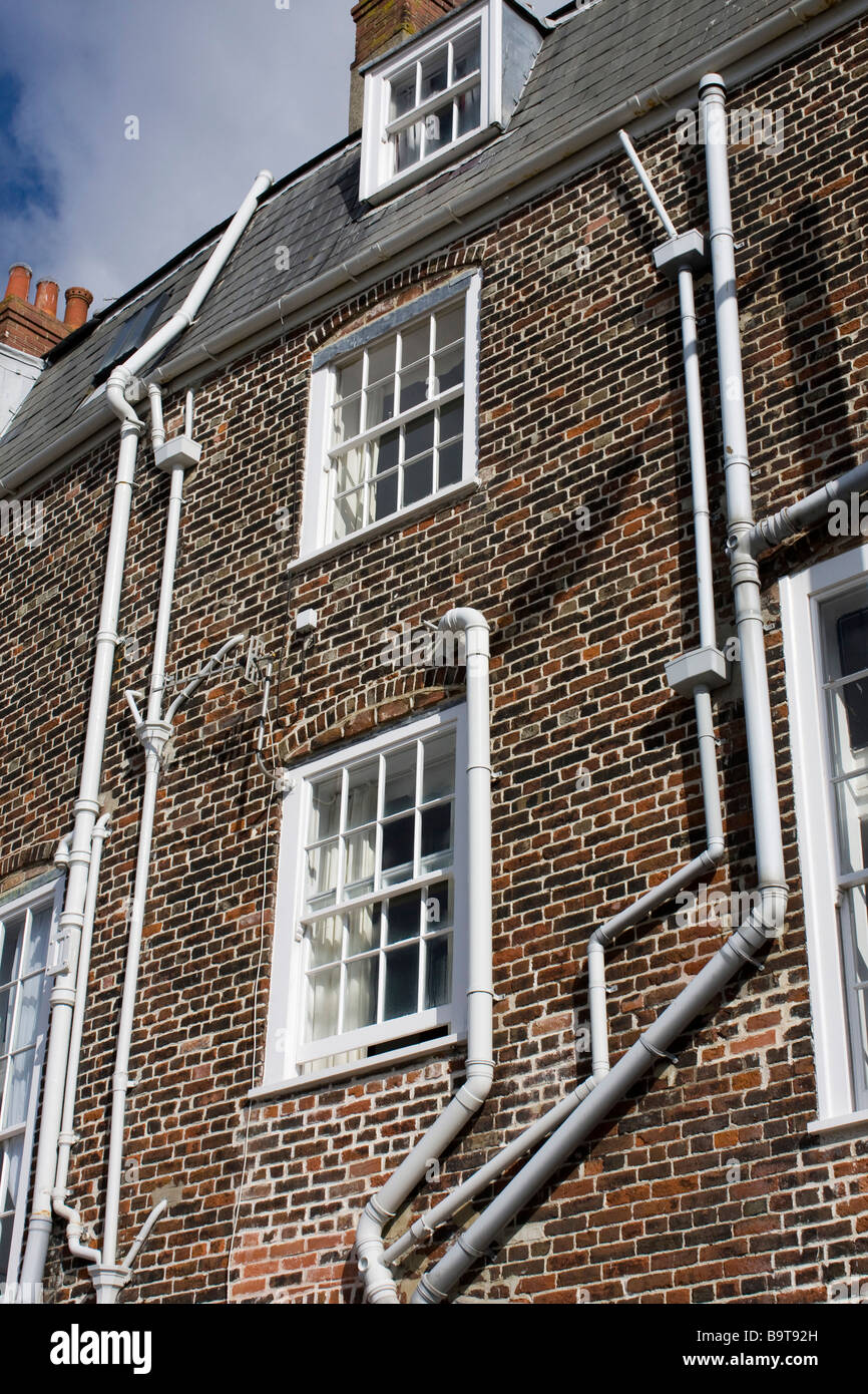 complicated drain pipes weymouth seaside town dorset england uk gb Stock Photo