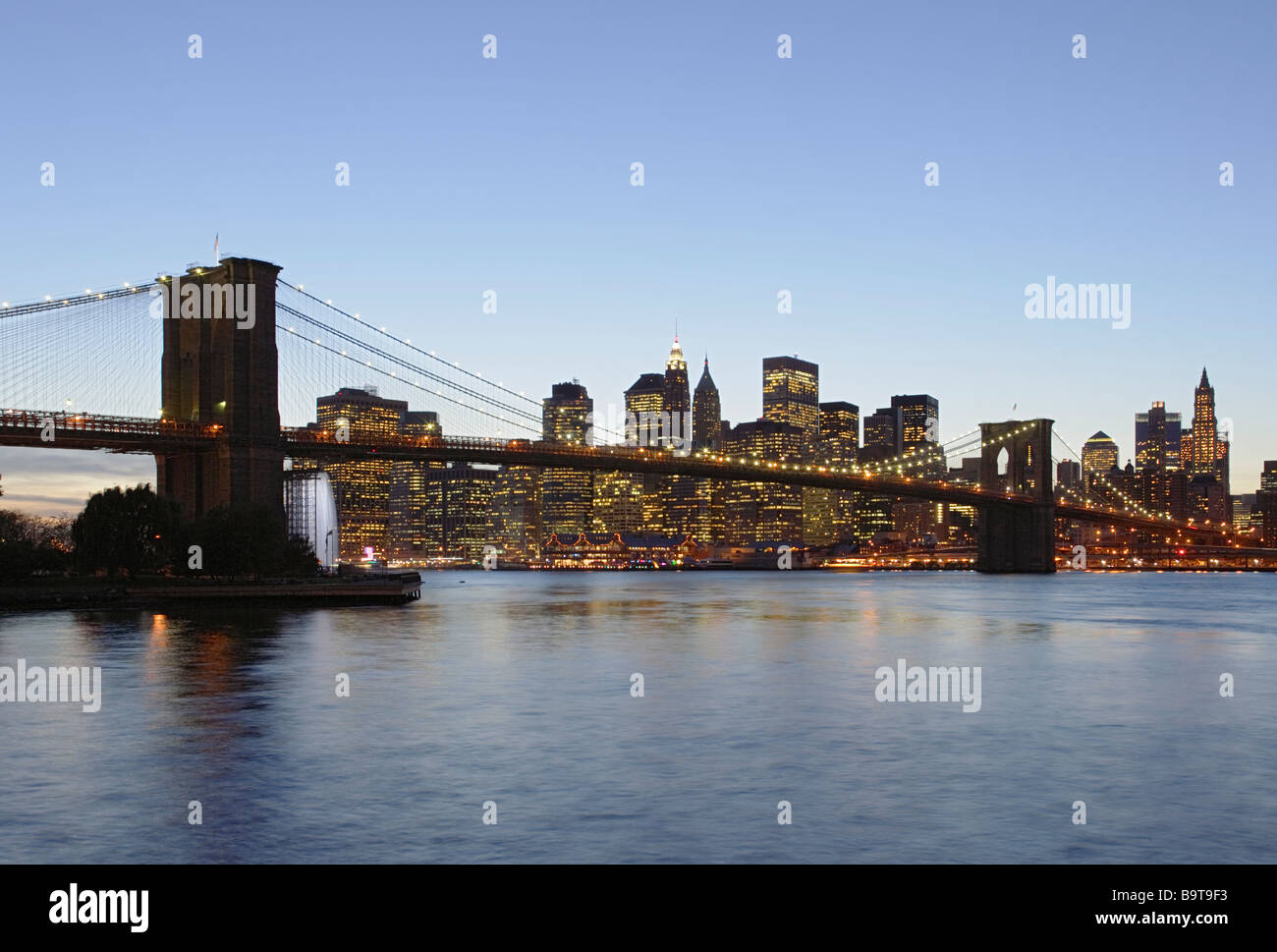 Brooklyn and manhattan bridges over the east river at night hi-res ...