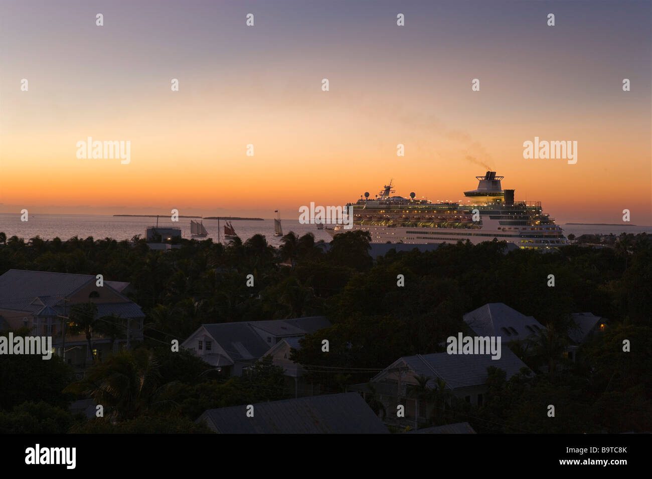 Cruise ship sailing from Key West cruise terminal at sunset, Key West, Florida Keys, USA Stock Photo