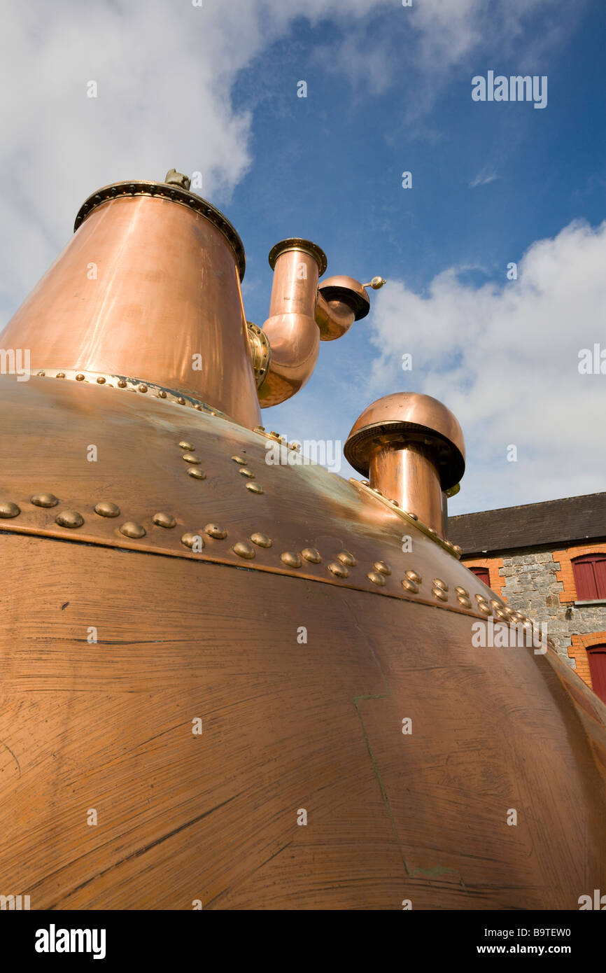 Copper Distilling Kettle. An old massive copper mash cooker is on