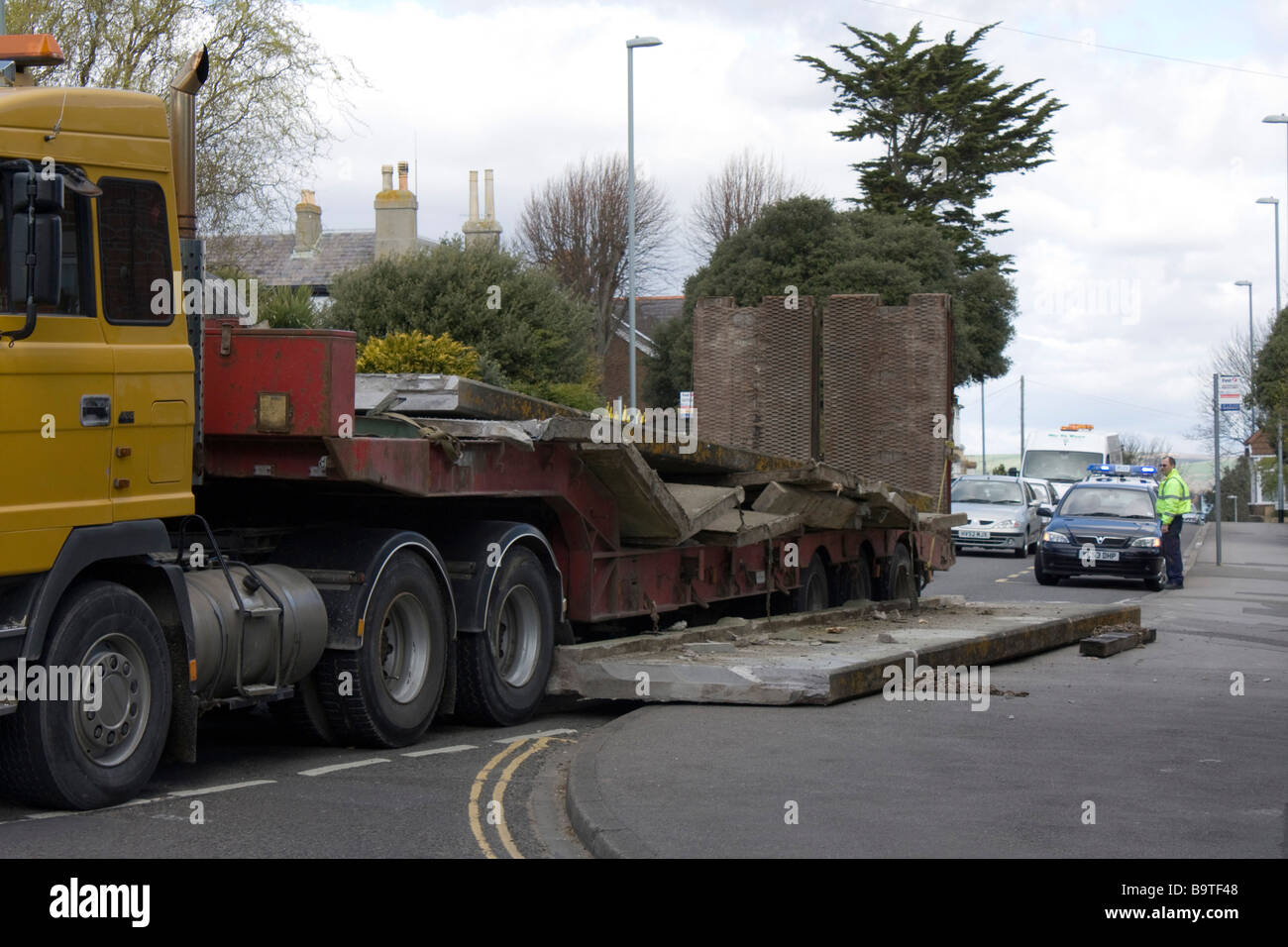lorry sheds load of concrete onto footway accident weymouth seaside