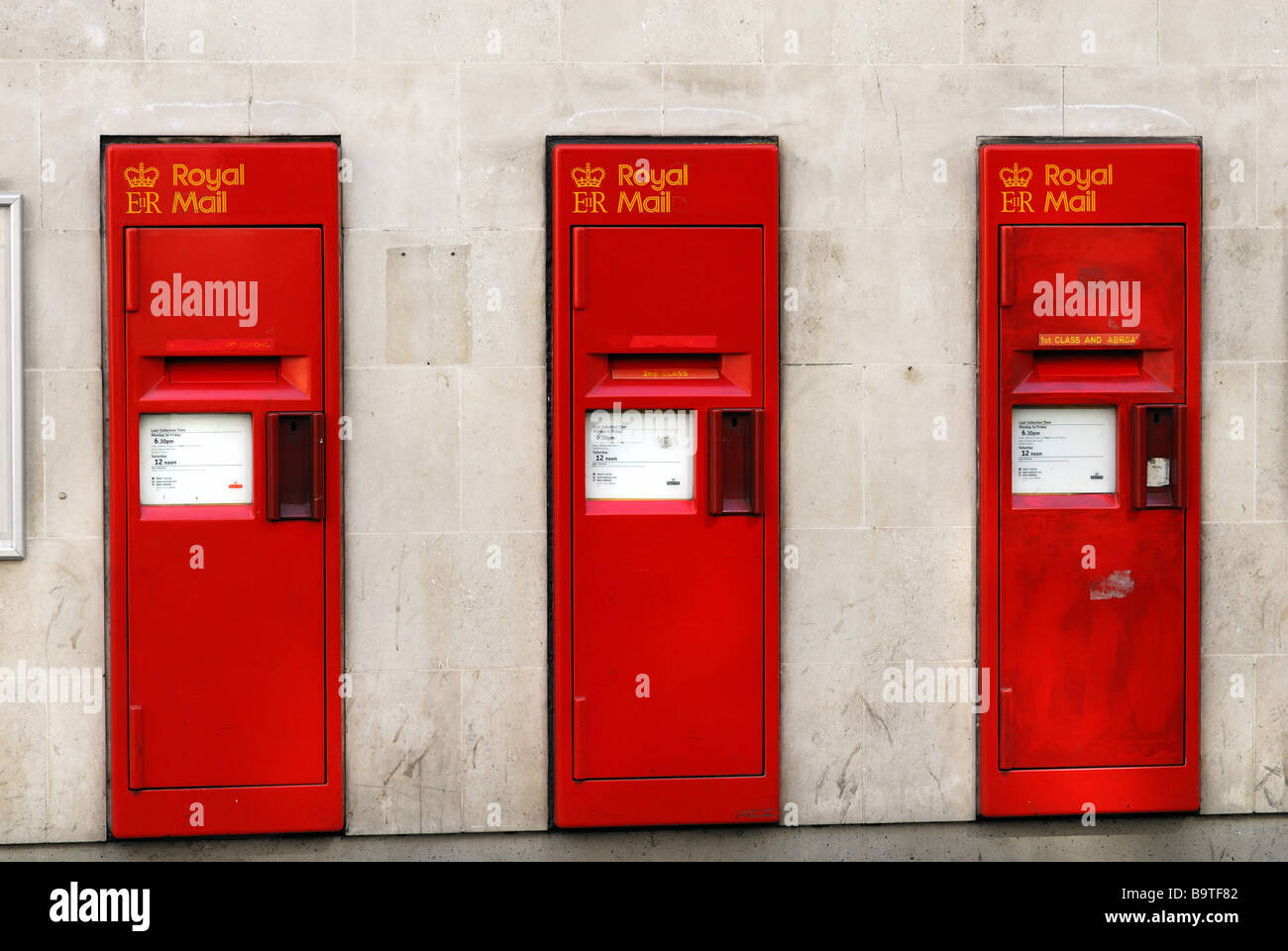 Three royal mail post boxes Stock Photo - Alamy
