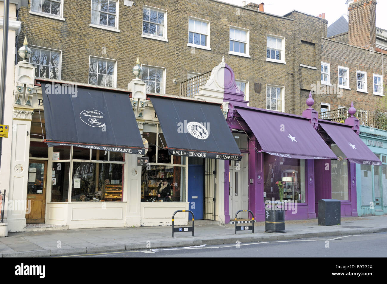 Cafe awnings Newington Green London England UK Stock Photo