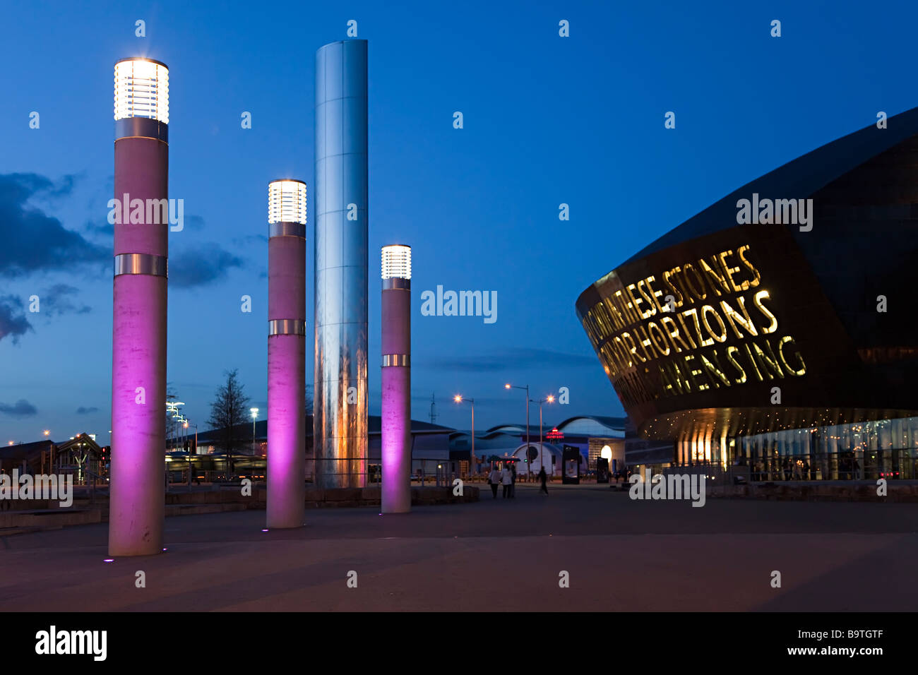Lights on pillars outside the Millennium Centre at dusk Cardiff Wales