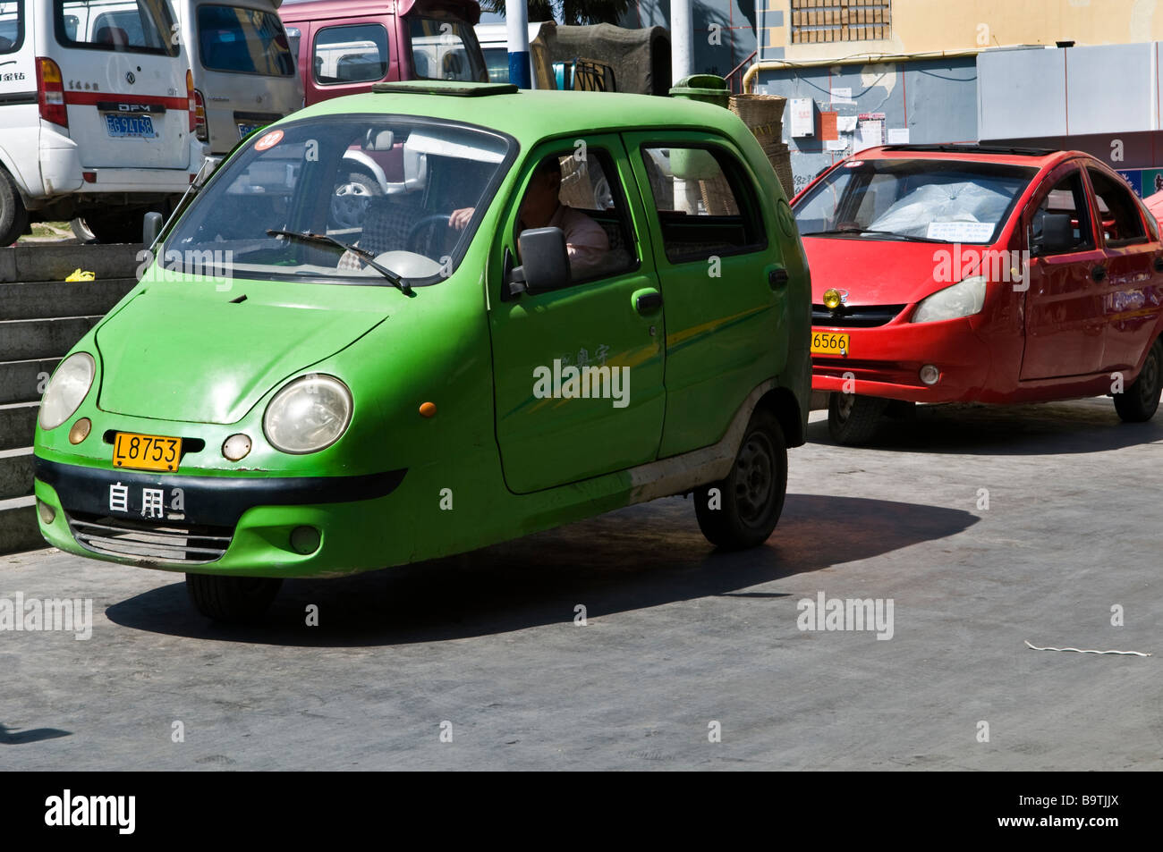 Funny cars in the mountainous regions of South Yunnan province, China. Stock Photo