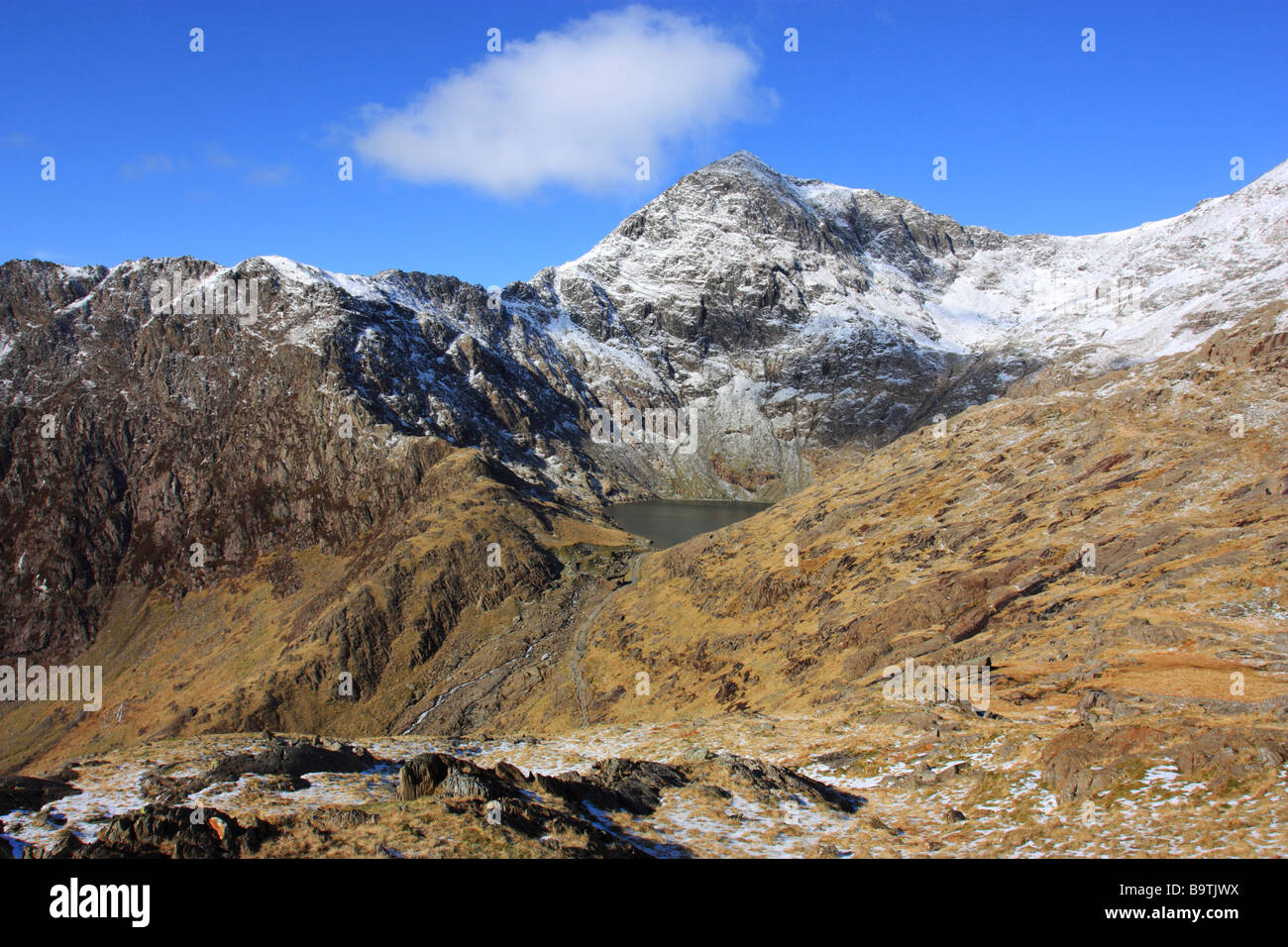 Yr Wyddfa, the summit of Snowdon and the highest peak in Wales, viewed from the Pyg track ascent Stock Photo