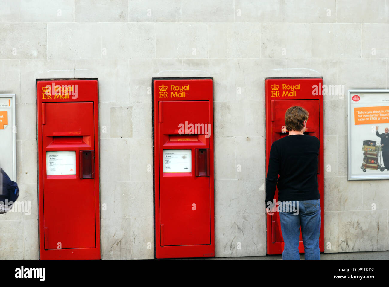 Person using postal boxes Stock Photo Alamy Person using postal boxes Stock Photo Alamy