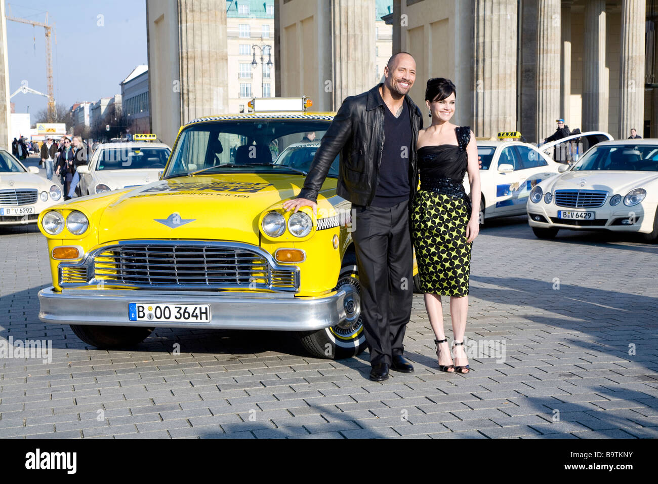 Dwayne Johnson US actor and Actress Carla Gugino in front of the Brandenburg gate in Berlin on Tuesday March 31 2009 Stock Photo