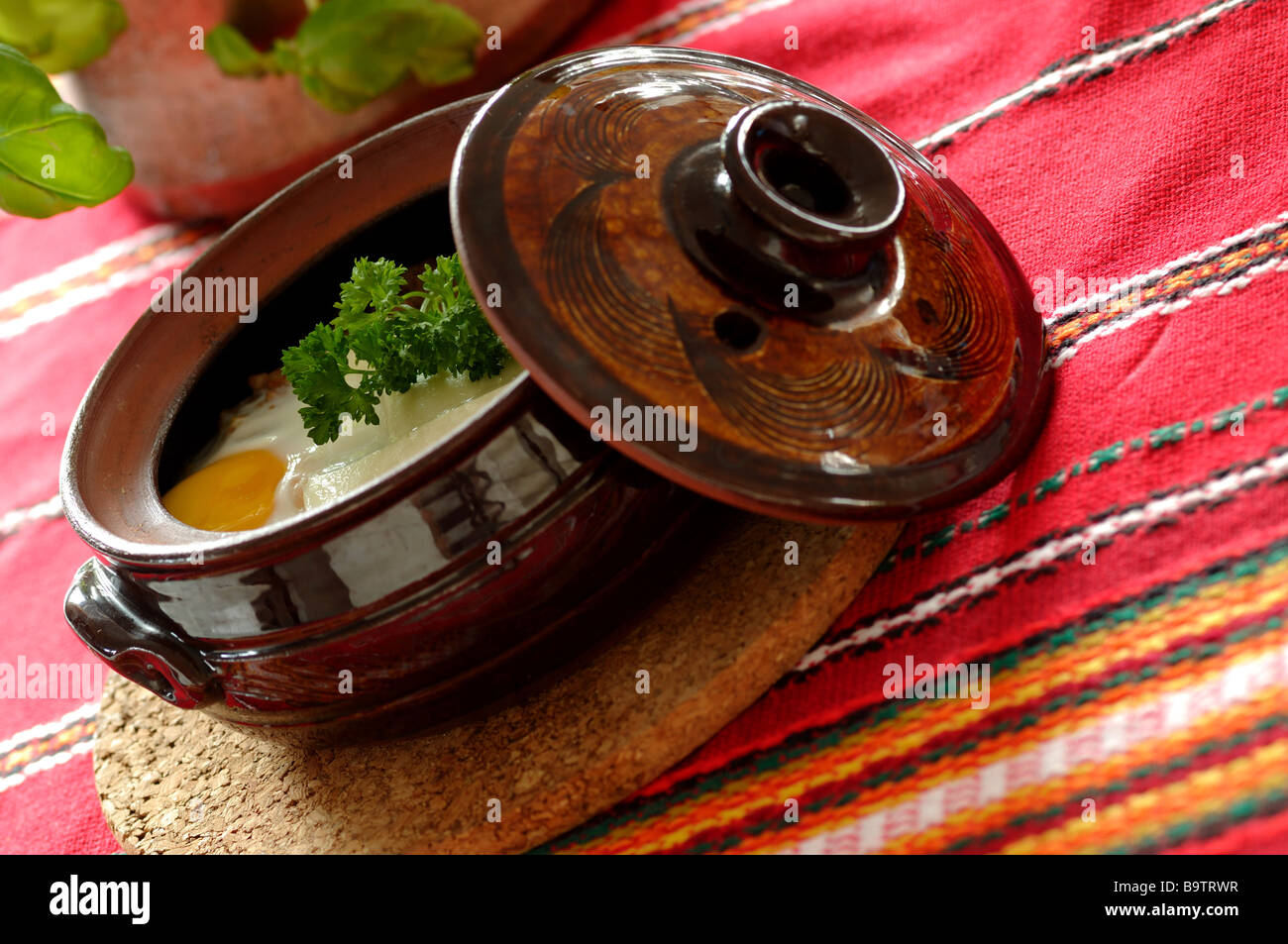 Traditional bulgarian meal baked in a ceramic gjuvetche Stock Photo - Alamy
