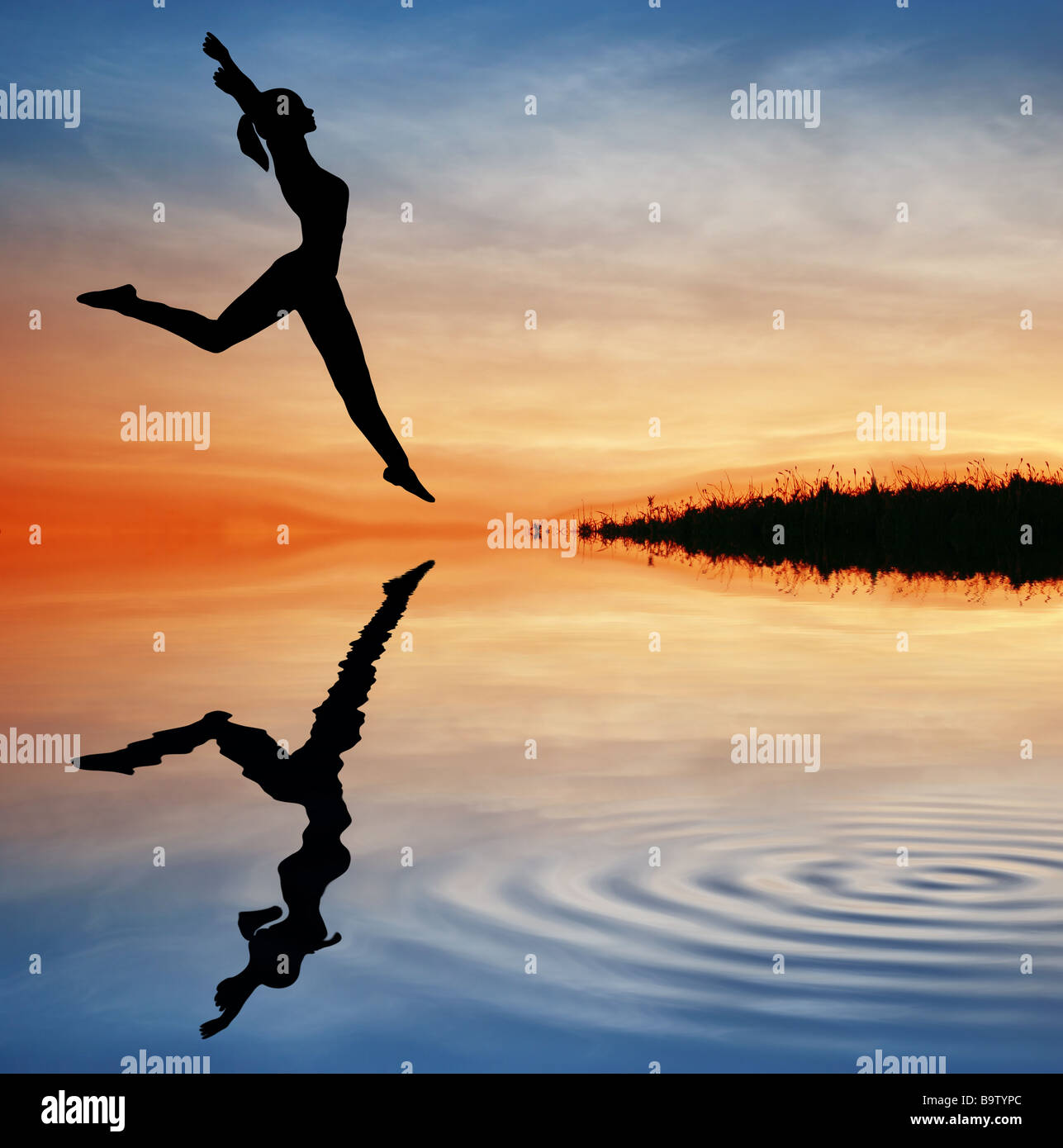 silhouette jump girl on water Stock Photo