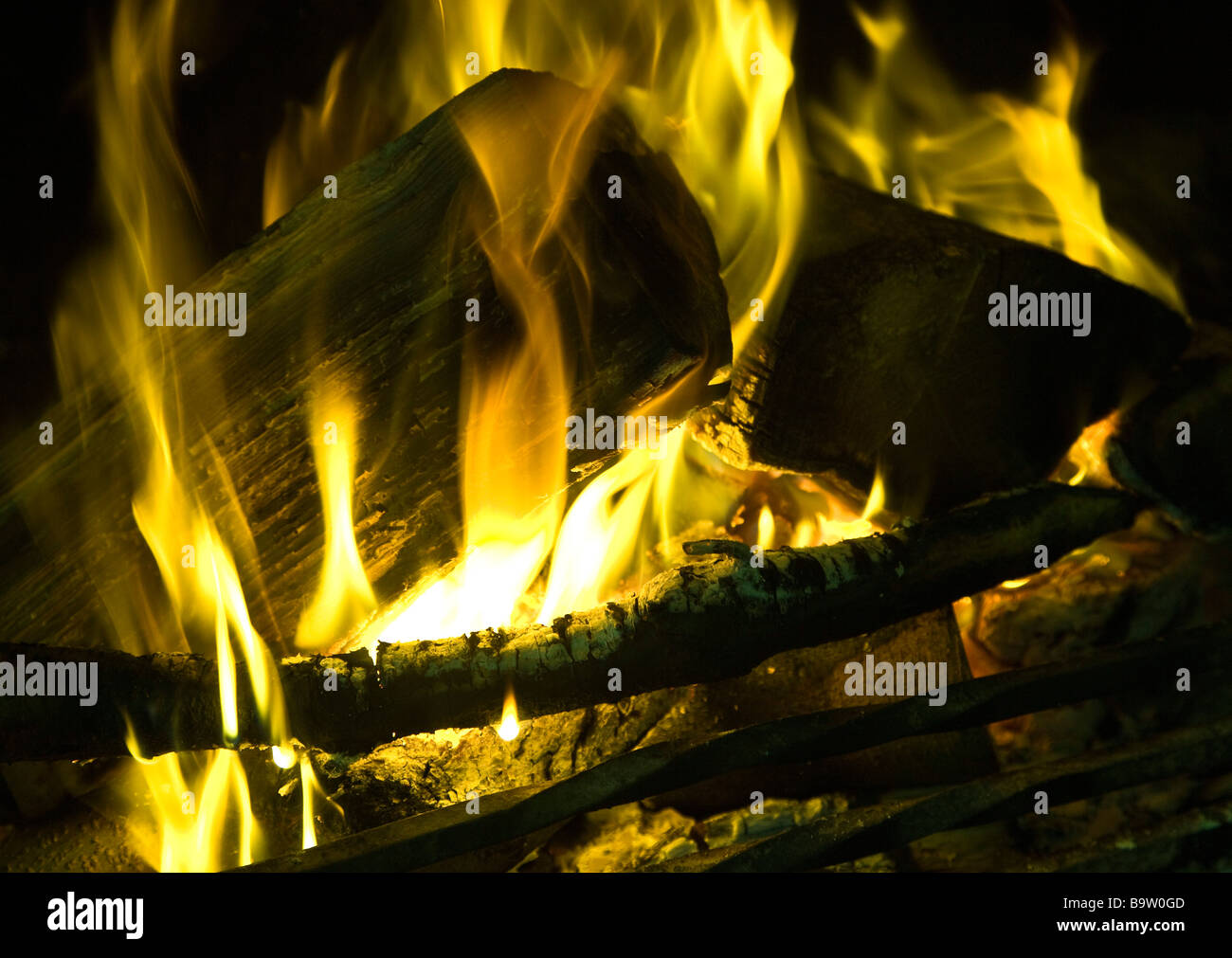 A Log Fire Burning in a Grate Stock Photo Alamy