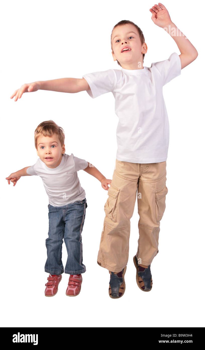 Boy and girl jumping Stock Photo - Alamy