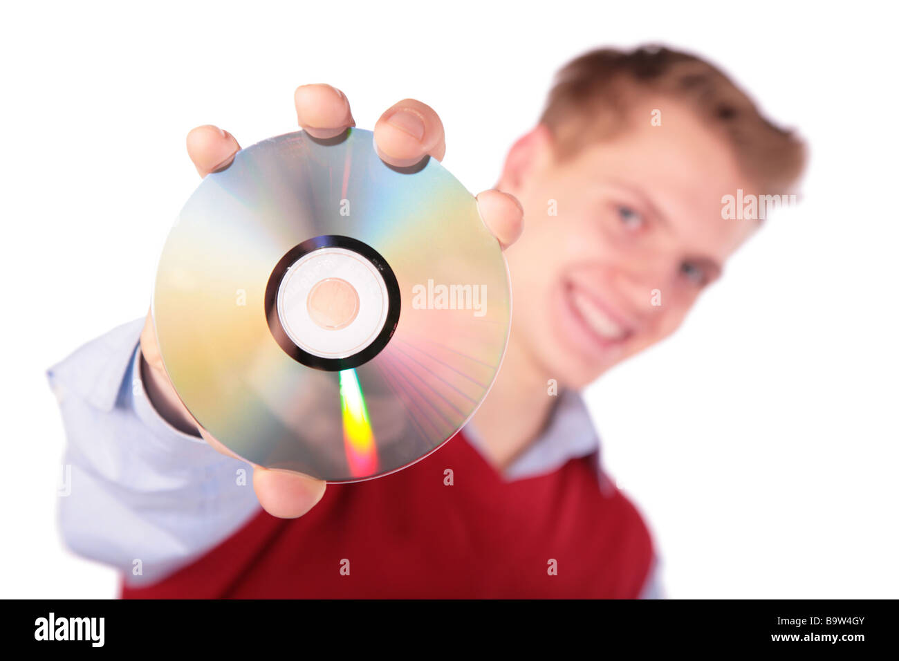 Boy in red jacket with CD Stock Photo