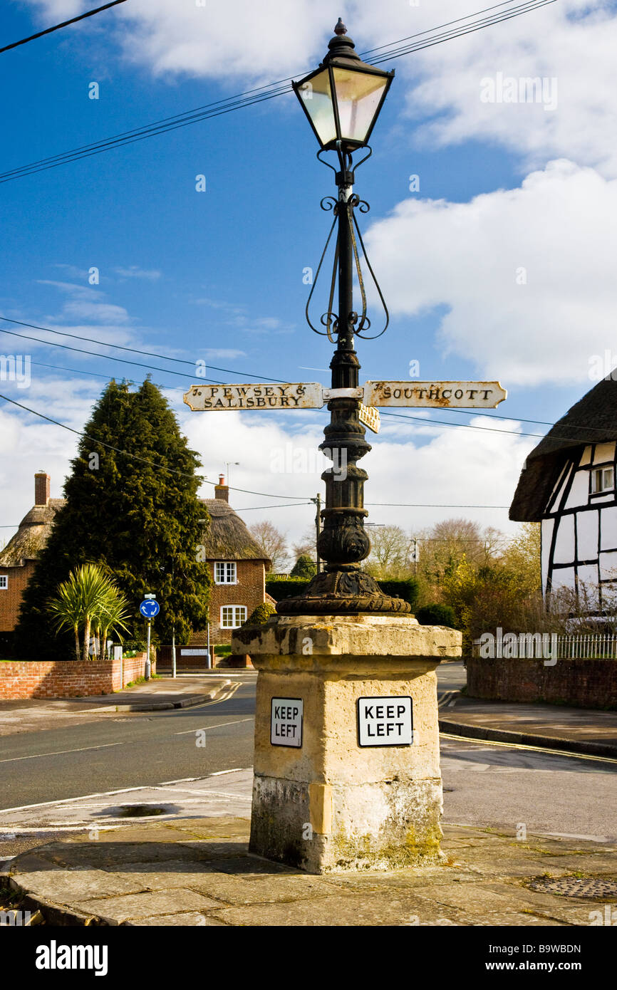 An old signpost in the village of Pewsey in Wiltshire England UK Stock Photo