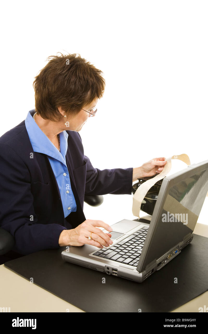 Court reporter transcribing her notes into a laptop computer Isolated