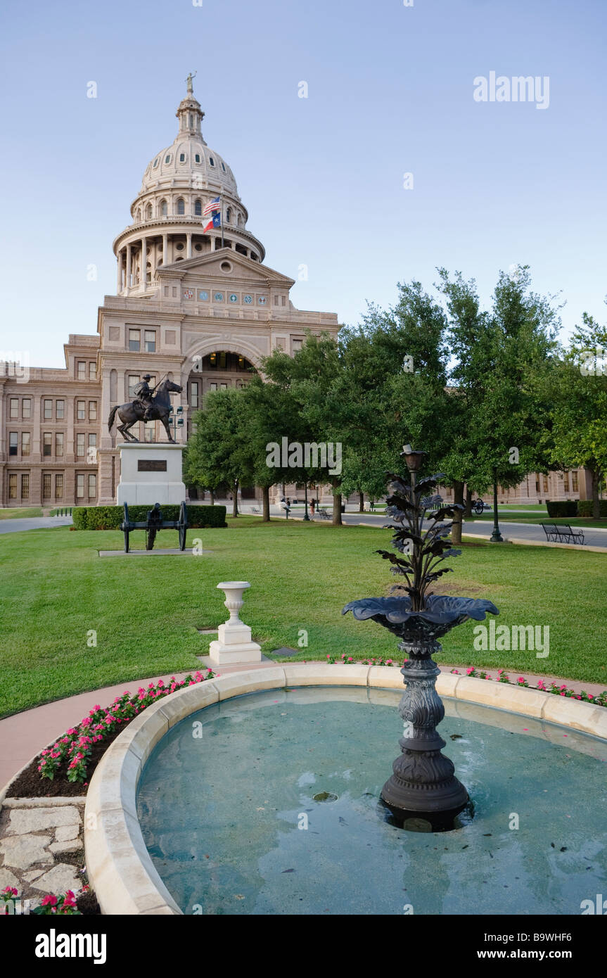 Fountain and statue in the gardens of the State Capitol of Texas in Austin Stock Photo