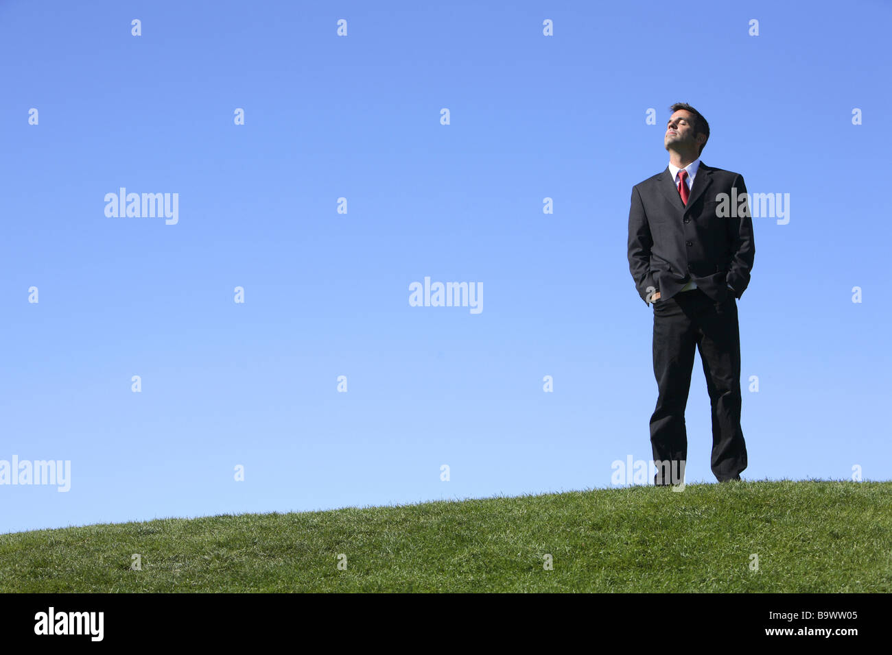 Businessman standing outdoors with copyspace Stock Photo