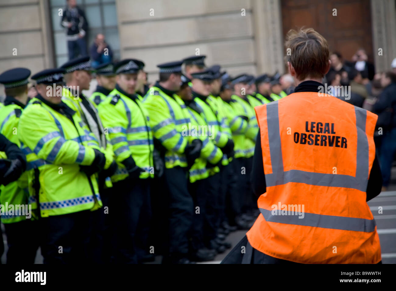 Legal observer overlooking a police cordon during the G20 protests, London 2009 Stock Photo