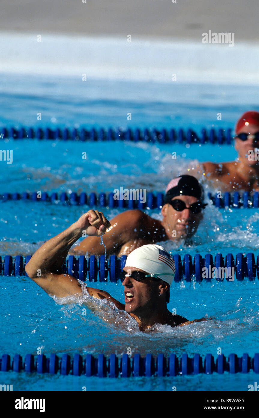 Male swimmer reacts after winning a race Stock Photo