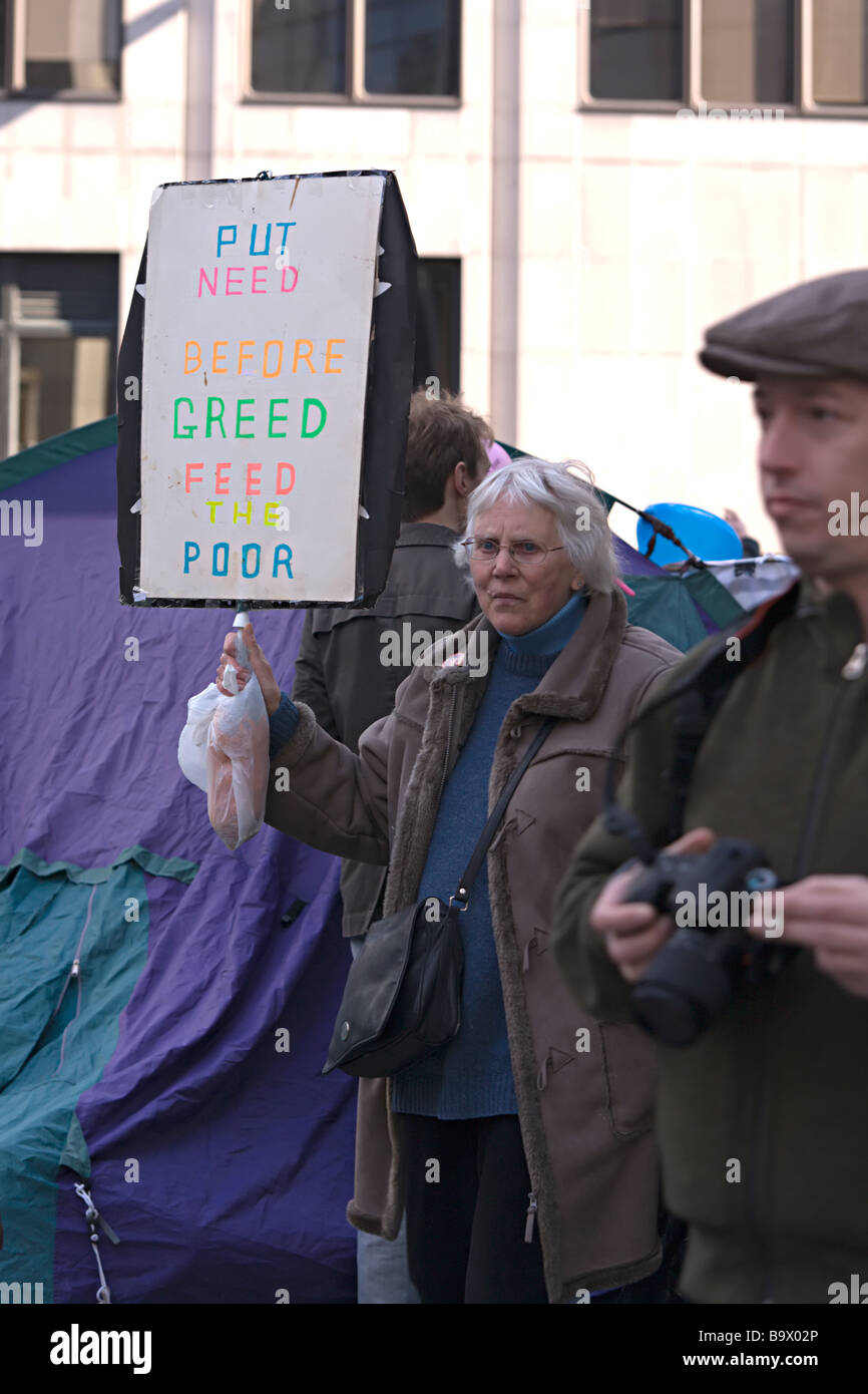 Older lady protesting climate change in London Stock Photo