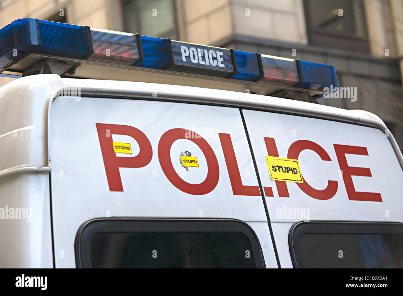 Police van stickered with 'stupid' stickers by climate change protesters during G20 protests Stock Photo