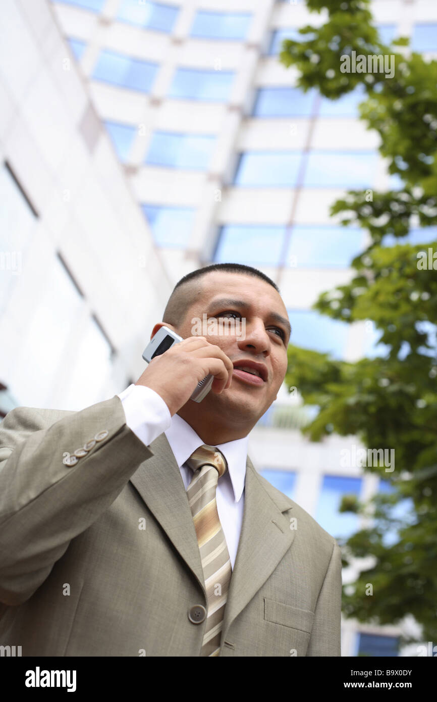 Hispanic businessman on cell phone Stock Photo