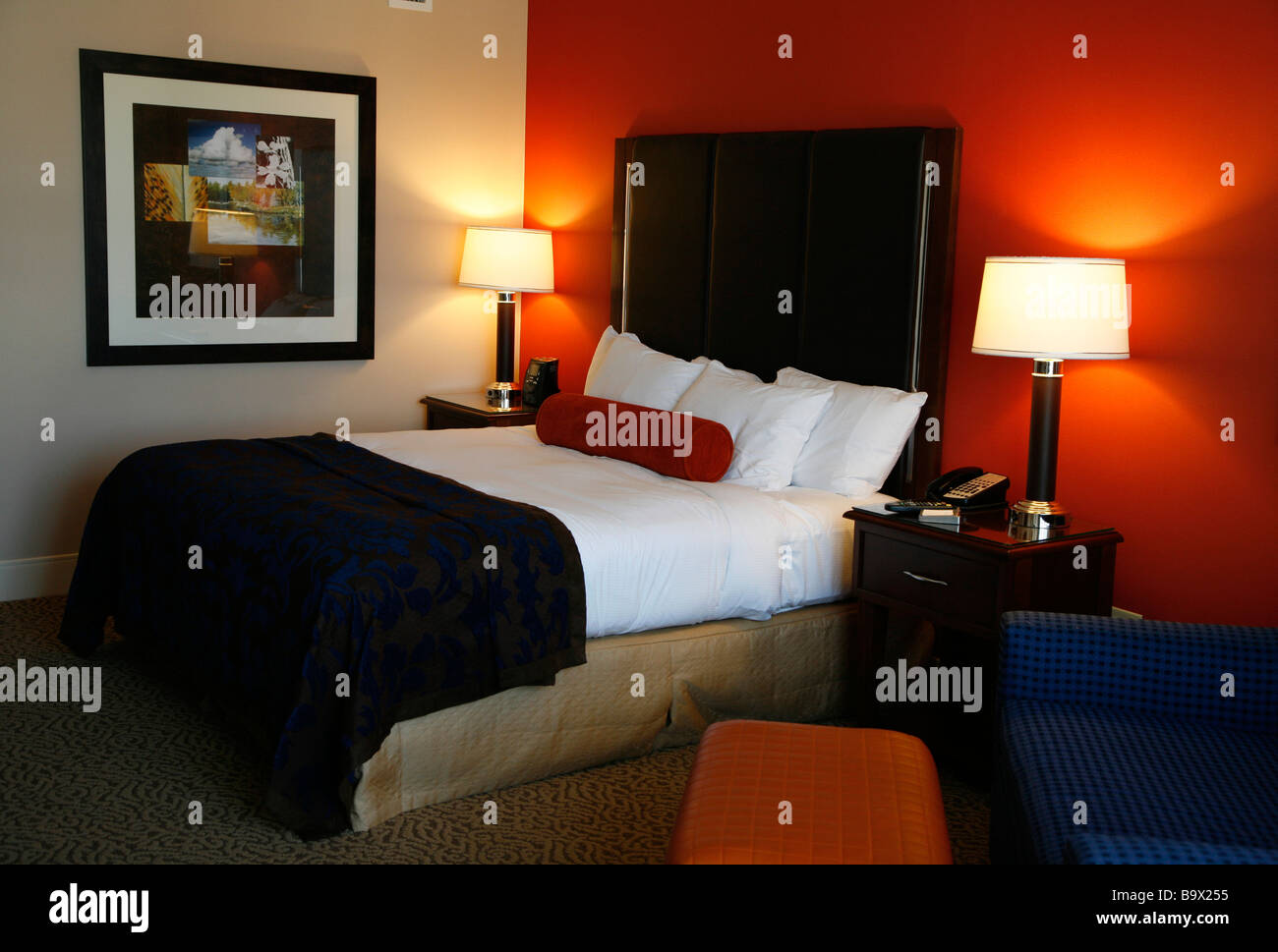 Generichotel bed room clean freshly made king bed Stock Photo