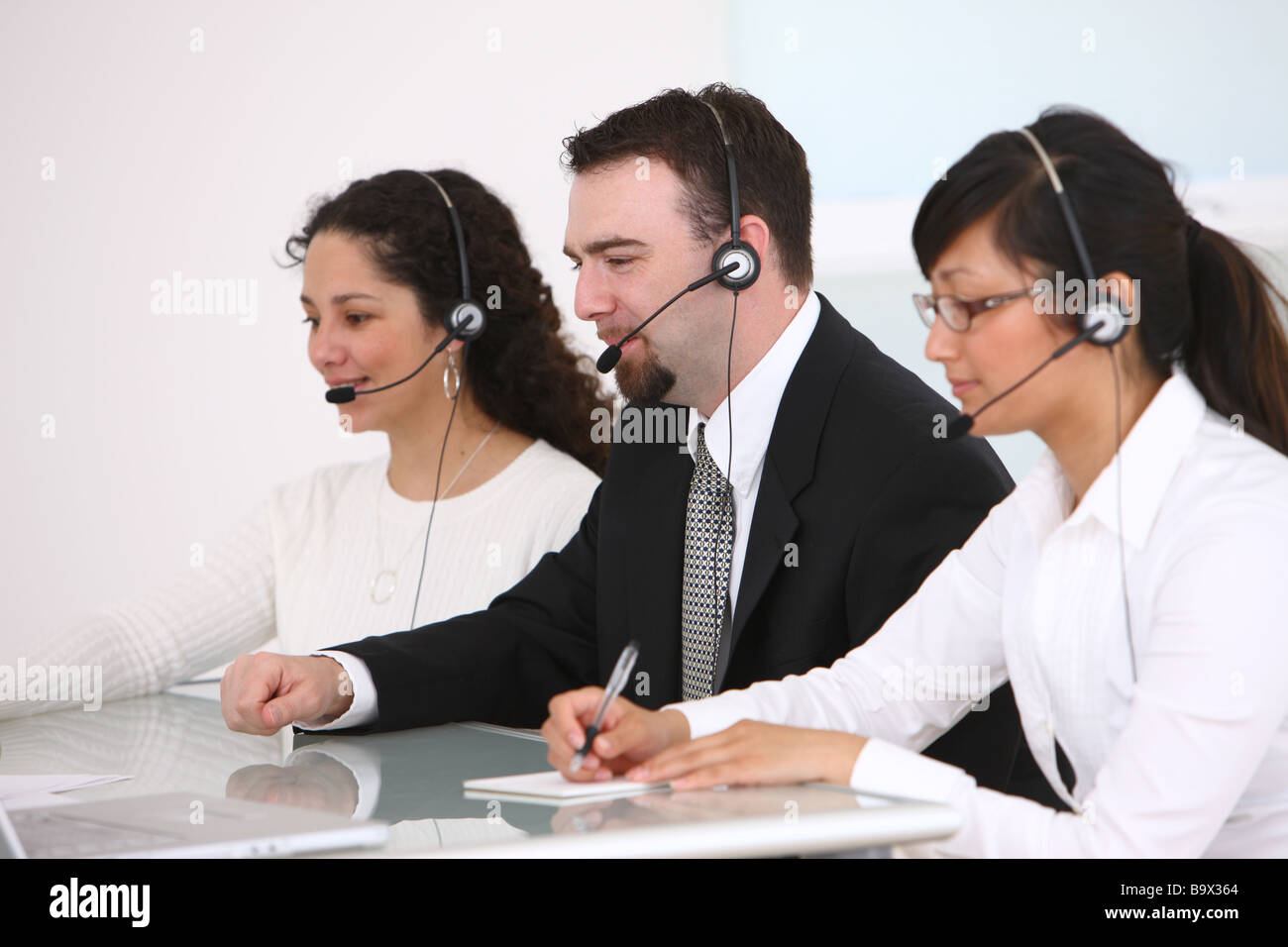  Three Customer Service People Stock Photo Alamy