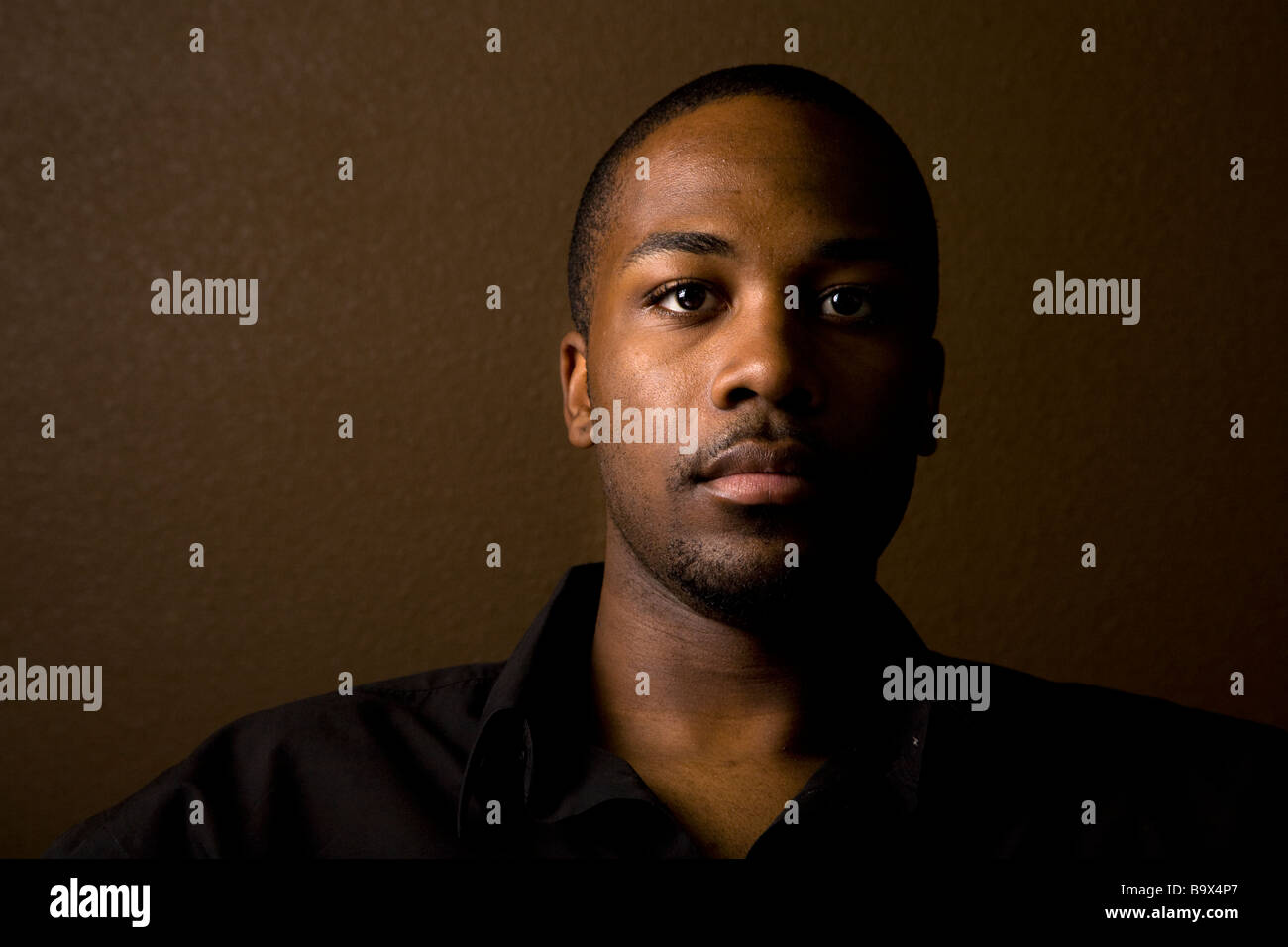 Portrait of a handsome young black man Stock Photo - Alamy