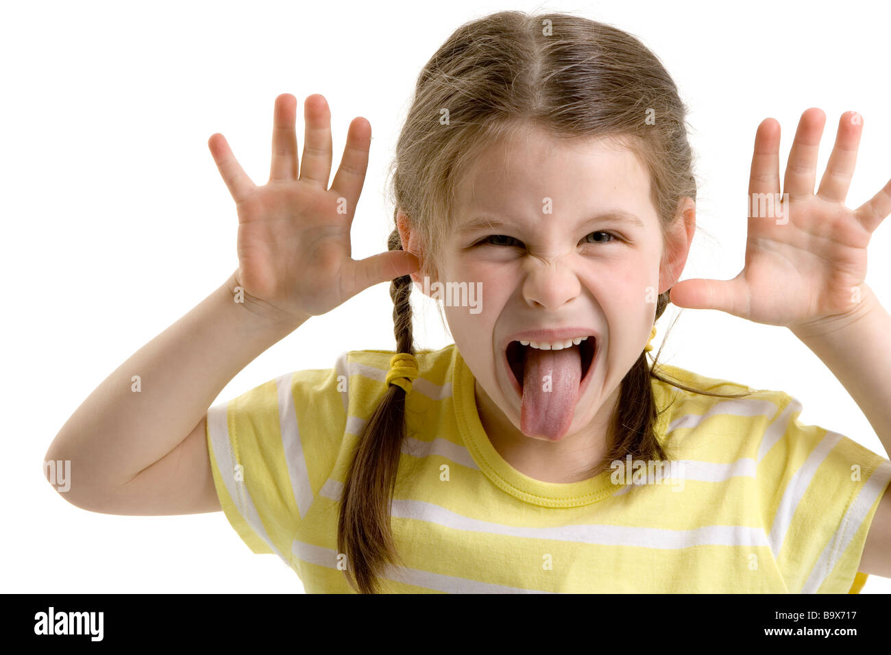 teaser girl sticking out her tongue Stock Photo