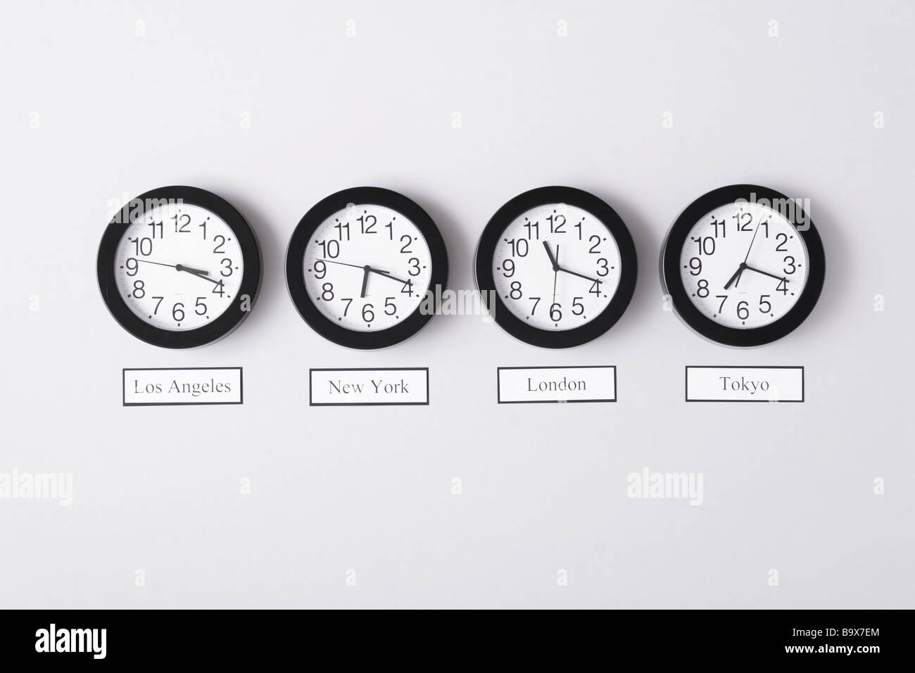 Clocks of various time zones Stock Photo
