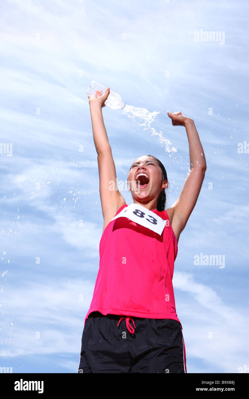 Female athlete celebrating Stock Photo